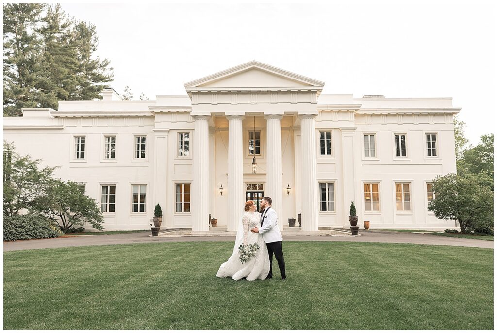 bride and groom in front of Wadsworth Mansion